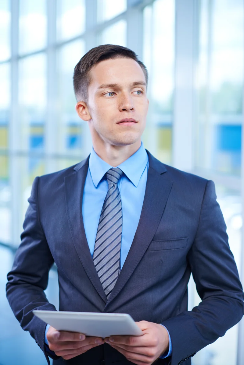 Professional woman smiling in a bright office environment